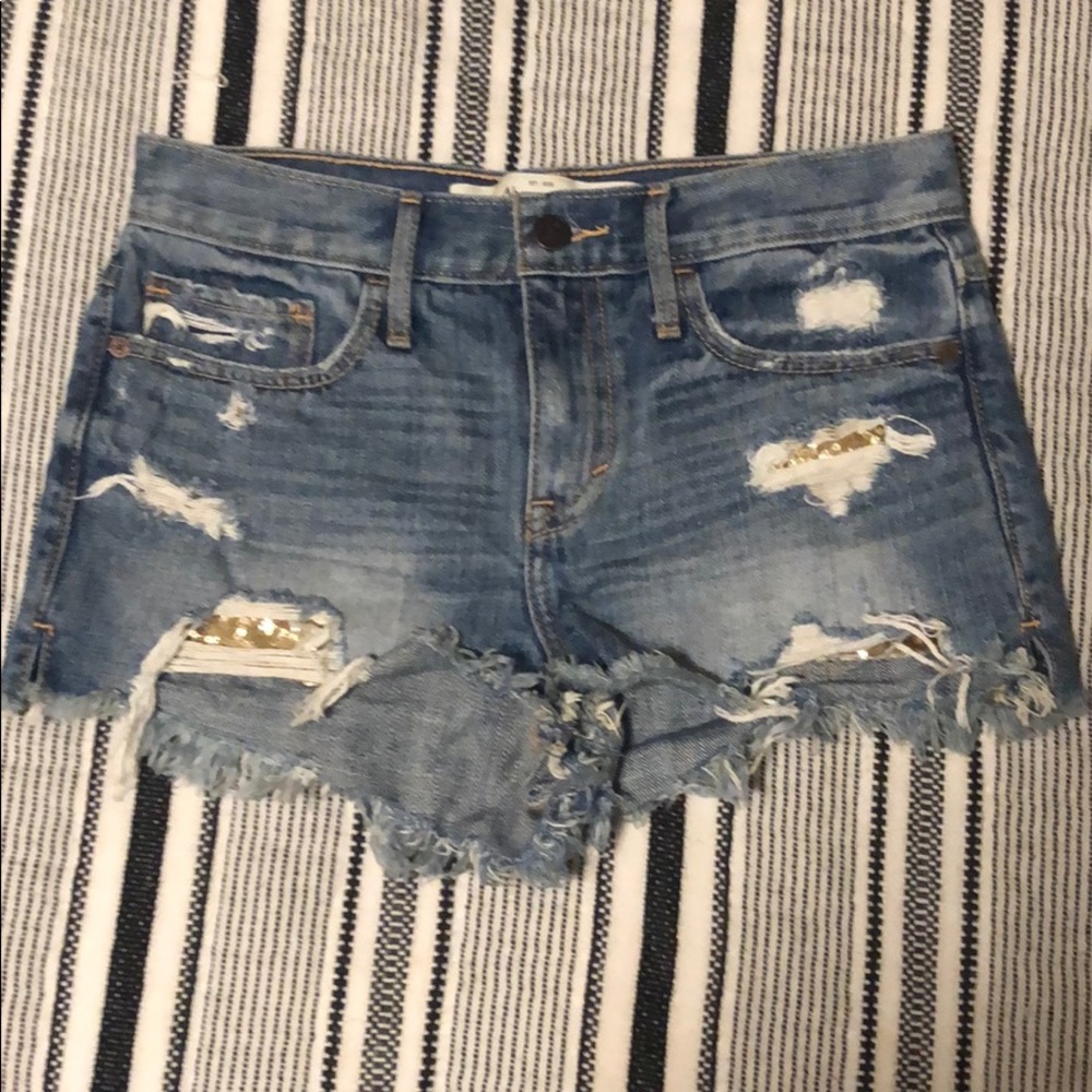 Denim shorts with sequin pockets